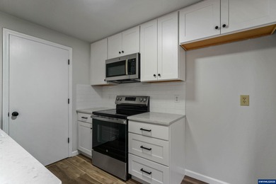 Move in ready! Fully remodeled 2 bed, 1.5 bath condo featuring