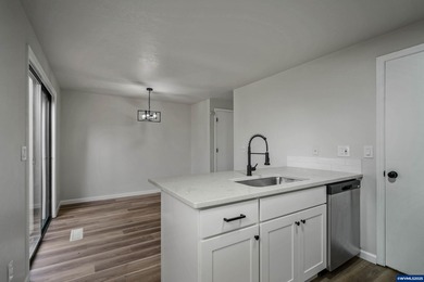 Move in ready! Fully remodeled 2 bed, 1.5 bath condo featuring