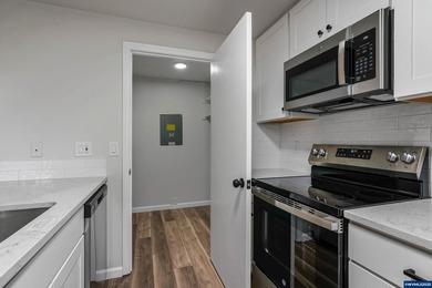 Move in ready! Fully remodeled 2 bed, 1.5 bath condo featuring