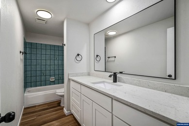 Move in ready! Fully remodeled 2 bed, 1.5 bath condo featuring