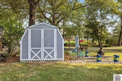 Discover lake living in this charming 3 bedroom, 2 bathroom home - photo 38
