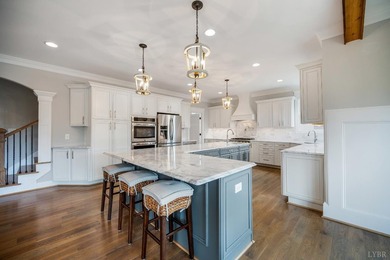 This LAVISH and STUNNING home on the lake offers a blend of - photo 25