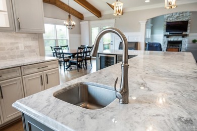 This LAVISH and STUNNING home on the lake offers a blend of - photo 30