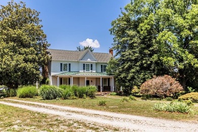 Welcome to this extraordinary circa-1911 estate nestled at the - photo 2