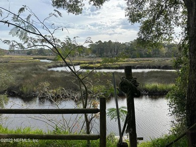 Build your dream home on this 0.52-acre lot nestled along serene - photo 3