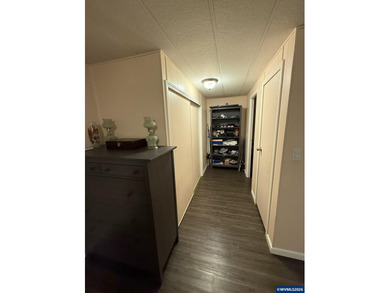 Nicely updated home w/new LVP flooring, metal roof, updated