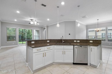 Welcome to this beautifully updated coastal retreat in the - photo 17