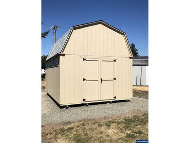 Nicely updated home w/new LVP flooring, metal roof, updated