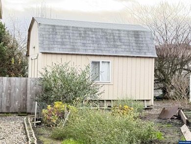 Nicely updated home w/new LVP flooring, metal roof, updated