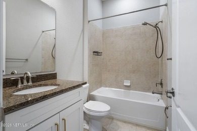 Welcome to this beautifully updated coastal retreat in the - photo 25