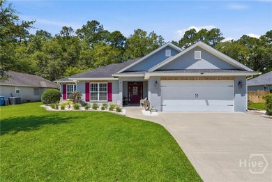 Welcome home to this charming 4BR, 2BA coastal cottage located - photo 1