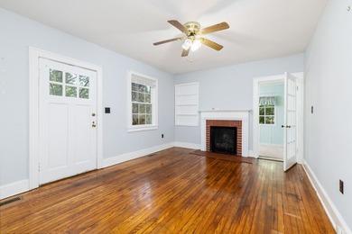 Charming 2-bedroom, 1-bath brick home situated on a corner lot - photo 4