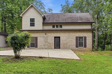 Tucked into a private, wooded setting just minutes from Center - photo 13