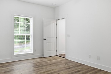 Tucked into a private, wooded setting just minutes from Center - photo 21