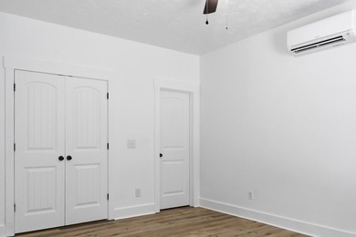 Tucked into a private, wooded setting just minutes from Center - photo 22