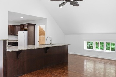 Tucked into a private, wooded setting just minutes from Center - photo 24
