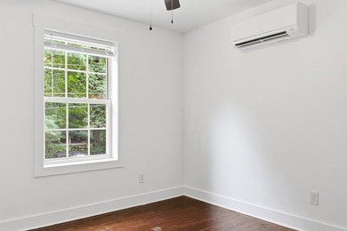 Tucked into a private, wooded setting just minutes from Center - photo 31