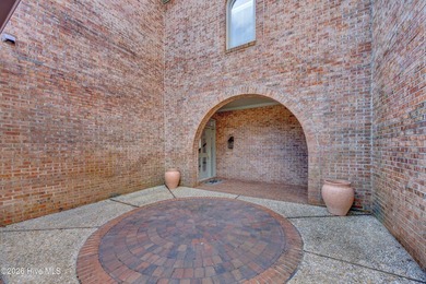 Coveted Landfall townhouse condominium in Colony Club! This end