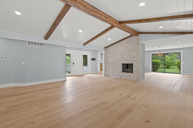 Stunning fully renovated 5BR/4.5BA ranch on secluded .88-acre - photo 12