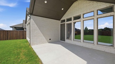 Step off the front porch into the extended entryway with a - photo 16