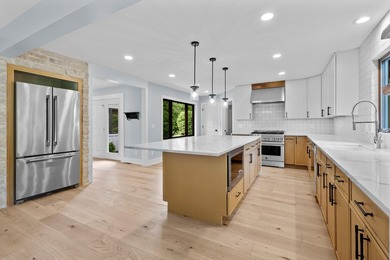 Stunning fully renovated 5BR/4.5BA ranch on secluded .88-acre - photo 20