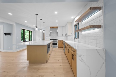 Stunning fully renovated 5BR/4.5BA ranch on secluded .88-acre - photo 21