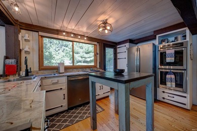 Enjoy year-round lake living from this original Yankee Barn post - photo 15
