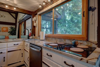Enjoy year-round lake living from this original Yankee Barn post - photo 17