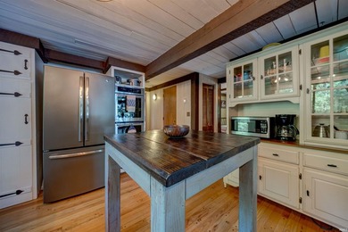 Enjoy year-round lake living from this original Yankee Barn post - photo 18