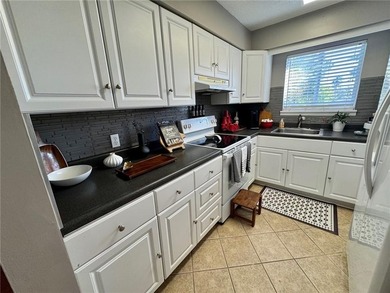 This is a two bedroom two bath condo has a large back porch - photo 4