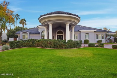 Nestled within the prestigious Estates at Litchfield Park, this - photo 1