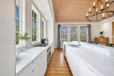 239 Sand Oaks Circle is a thoughtfully designed coastal retreat