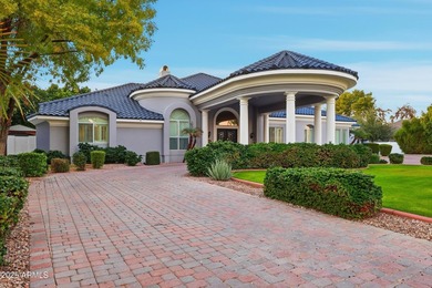 Nestled within the prestigious Estates at Litchfield Park, this - photo 2