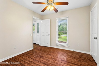 Located in the desirable golf community of Diamondhead, this - photo 13