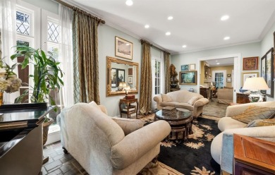 Welcome to this exquisite European Manor perfectly situated in