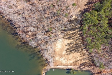 Prime lakefront water property with 1,000 +/- feet of shoreline - photo 33