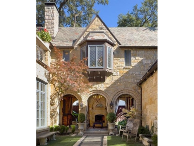 Welcome to this exquisite European Manor perfectly situated in