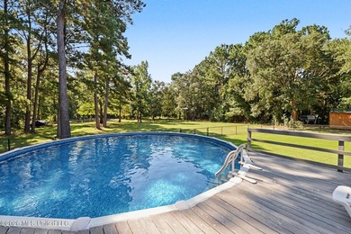 PRICE REDUCED! Situated on 7 acres with a pond and a 30' - photo 37