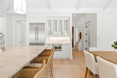 Experience coastal luxury in this brand-new 2026 built home - photo 14