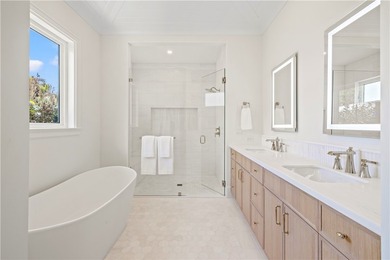 Experience coastal luxury in this brand-new 2026 built home - photo 22