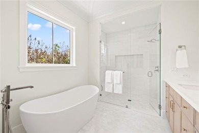 Experience coastal luxury in this brand-new 2026 built home - photo 23