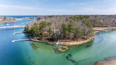 Set on coveted Pine Island, this exceptional waterfront offering - photo 2