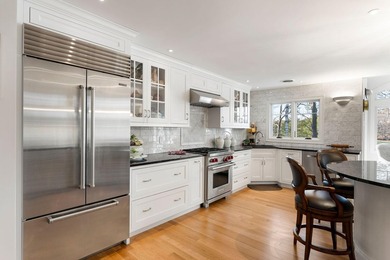 Set on coveted Pine Island, this exceptional waterfront offering - photo 7