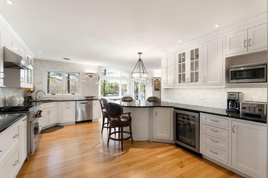 Set on coveted Pine Island, this exceptional waterfront offering - photo 8