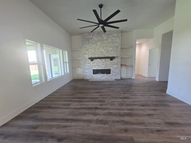 This beautifully designed one-level home offers 2,067 square