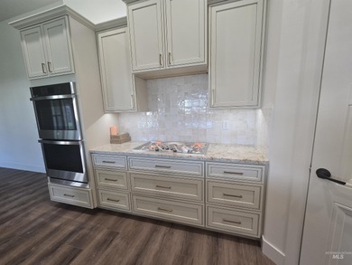 This beautifully designed one-level home offers 2,067 square