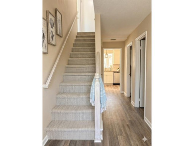This comfortable cape/colonial home sits on a beautiful wooded - photo 8