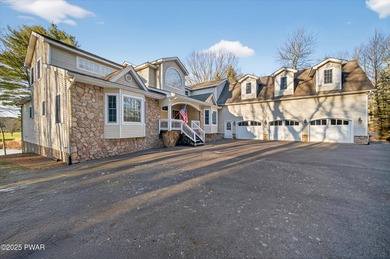 Welcome to this immaculate 4-bedroom LAKEFRONT home in the - photo 2