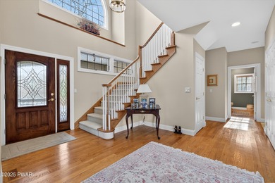 Welcome to this immaculate 4-bedroom LAKEFRONT home in the - photo 5