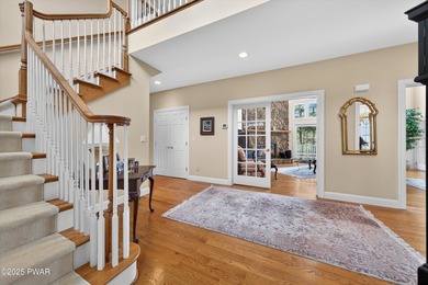 Welcome to this immaculate 4-bedroom LAKEFRONT home in the - photo 6